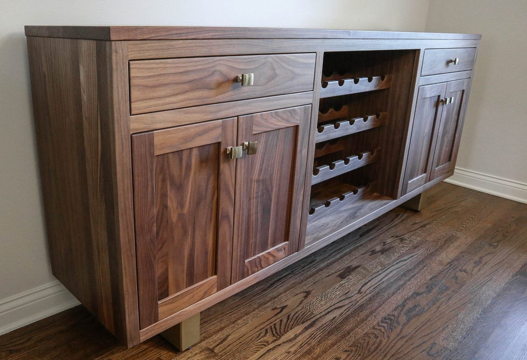 Downers-Grove-18x84x36-Liquor-Cabinet-solid-walnut-clean-edge-no-distress-bloack-metal-base-natural-flat-Anodized-Gold-legs-1280x874